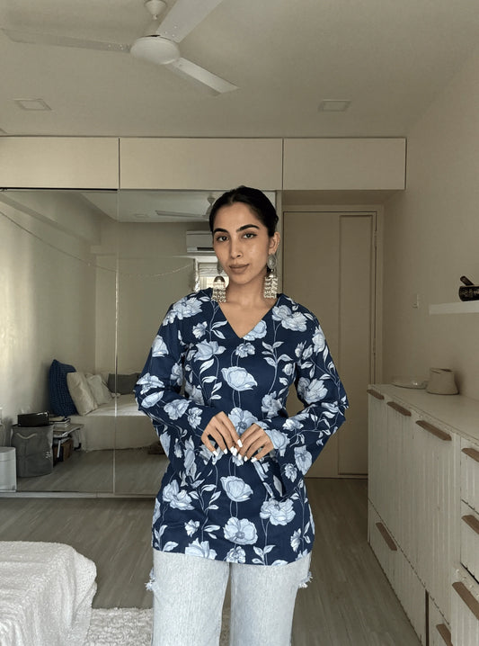 “Woman wearing navy floral bell sleeves kurti – Isha front view”

