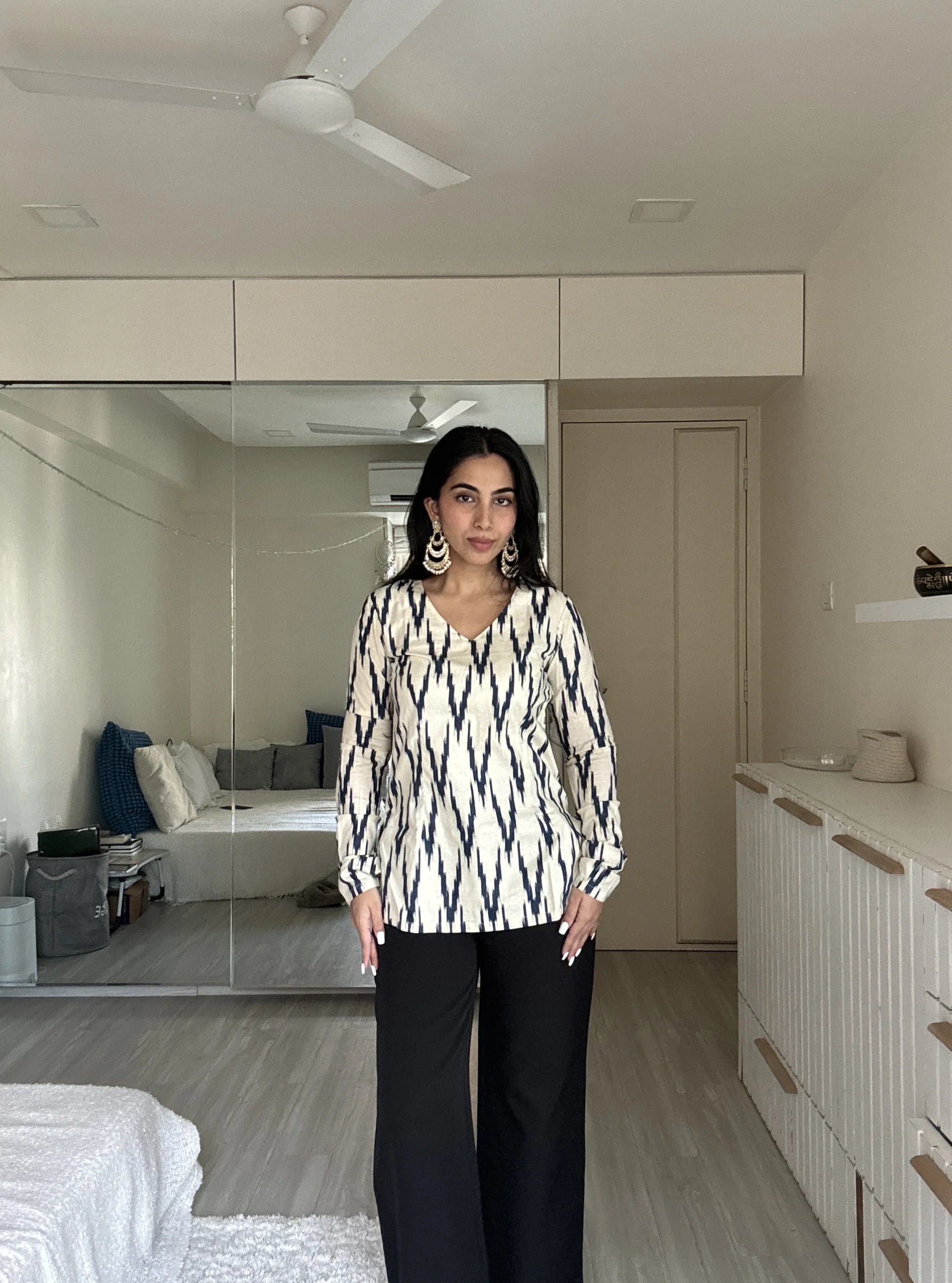 “Sleeve detail of Naina off‑white navy ikat long sleeved kurti”